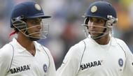 VVS is all ears for his captain as he walks back to the pavilion after a successful partnership.